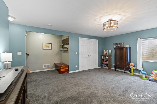 840 Peony Ln, Bourbonnais, IL 60914 - carpeted office with a chandelier and baseboards