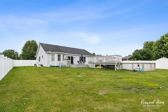 840 Peony Ln, Bourbonnais, IL 60914 - back of house featuring a fenced backyard and a deck