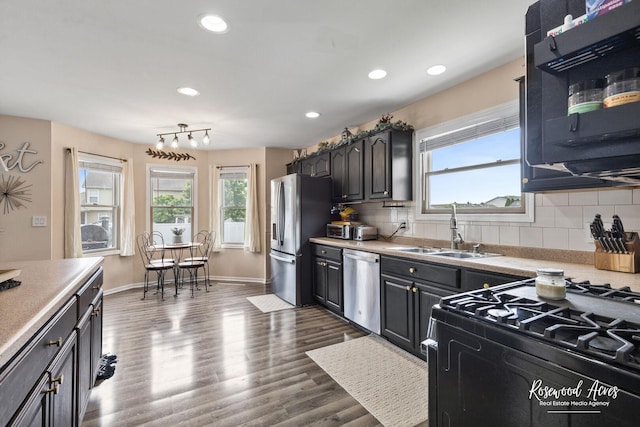 840 Peony Ln, Bourbonnais, IL 60914 - kitchen with black appliances, light countertops, recessed lighting, and tasteful backsplash