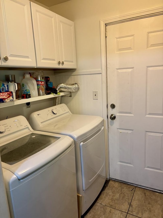 847 Teverton Ln, Crystal Lake, IL 60014 - laundry area with separate washer and dryer, cabinet space, a wainscoted wall, and tile patterned flooring