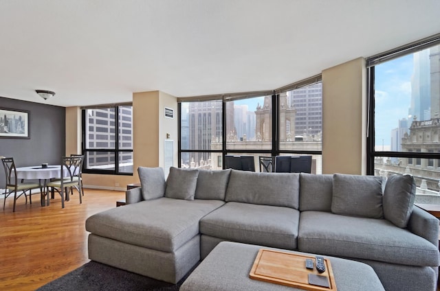 405 N Wabash Ave Unit 2211, Chicago, IL 60611 - living area with a city view, wood finished floors, and a wall of windows