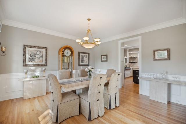 38W385 Stevens Glen Rd, Saint Charles, IL 60175 - dining room featuring crown molding, a chandelier, light wood-type flooring, and wainscoting