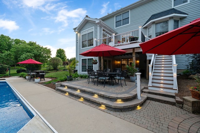 38W385 Stevens Glen Rd, Saint Charles, IL 60175 - back of property featuring outdoor dining space, a patio area, a balcony, and stairway