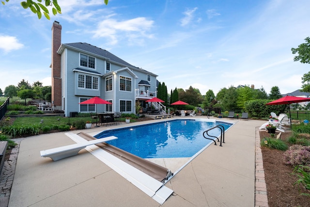 38W385 Stevens Glen Rd, Saint Charles, IL 60175 - view of pool with a diving board and a patio area