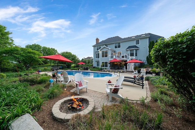 38W385 Stevens Glen Rd, Saint Charles, IL 60175 - swimming pool featuring an outdoor fire pit and a patio area