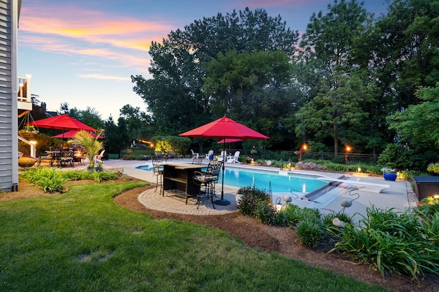 38W385 Stevens Glen Rd, Saint Charles, IL 60175 - view of pool with a patio area, a diving board, outdoor dining area, and view of scattered trees