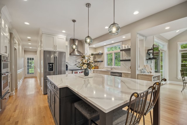 38W385 Stevens Glen Rd, Saint Charles, IL 60175 - kitchen featuring wall chimney range hood, stainless steel appliances, open shelves, light wood-style flooring, and recessed lighting