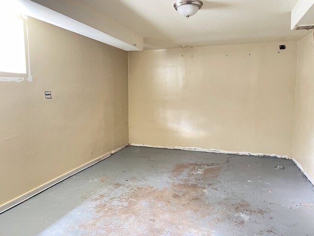 3909 W 71st St, Chicago, IL 60629 - spare room with concrete floors