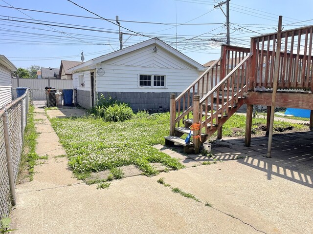 3909 W 71st St, Chicago, IL 60629 - view of yard featuring a deck
