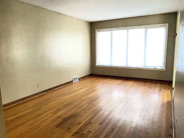 3909 W 71st St, Chicago, IL 60629 - unfurnished room with wood finished floors