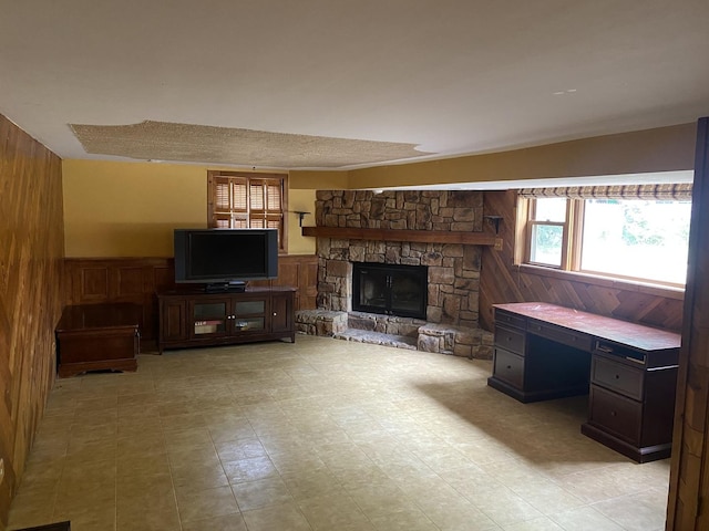 11737 S Kedvale Ave, Alsip, IL 60803 - living area with wooden walls, a fireplace, a wainscoted wall, and built in study area