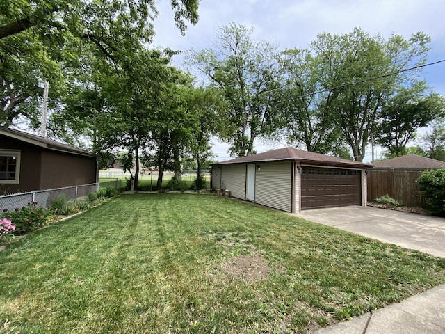 11737 S Kedvale Ave, Alsip, IL 60803 - view of yard featuring an outdoor structure and a detached garage