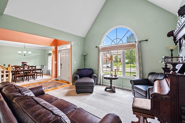 11646 Liberty Ln, Plainfield, IL 60585 - living room with high vaulted ceiling, a chandelier, and plenty of natural light