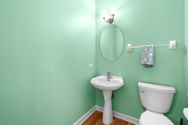 11646 Liberty Ln, Plainfield, IL 60585 - half bath featuring toilet and wood finished floors