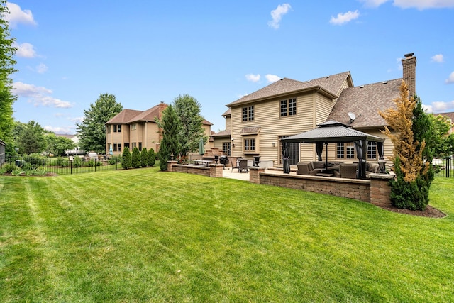 11646 Liberty Ln, Plainfield, IL 60585 - back of property featuring an outdoor living space, a gazebo, a patio, a chimney, and a shingled roof
