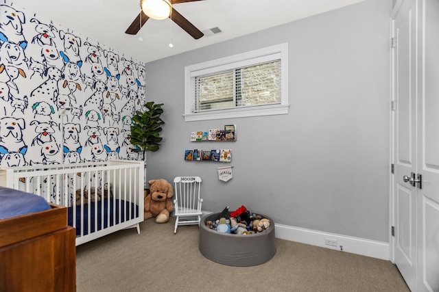 2769 N Kenmore Ave Unit 1, Chicago, IL 60614 - carpeted bedroom with a crib and ceiling fan