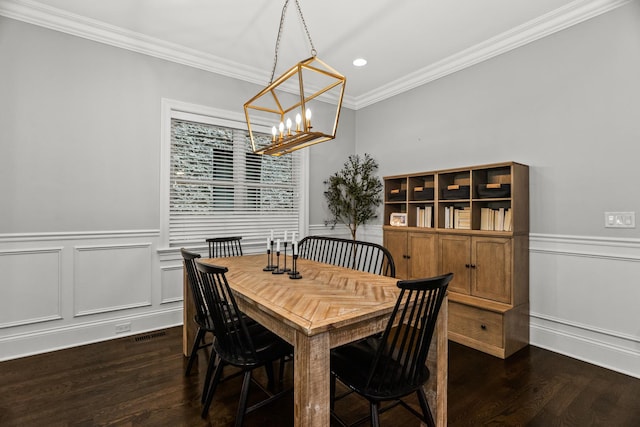 2769 N Kenmore Ave Unit 1, Chicago, IL 60614 - dining area with a chandelier, dark wood-style floors, crown molding, wainscoting, and recessed lighting