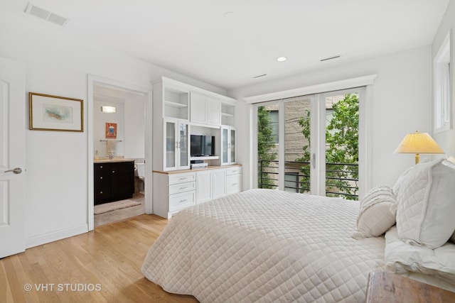2835 N Lakewood Ave Unit 2C, Chicago, IL 60657 - bedroom with light wood-style flooring, recessed lighting, and ensuite bathroom