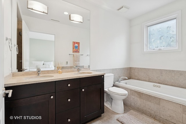 2835 N Lakewood Ave Unit 2C, Chicago, IL 60657 - full bathroom with double vanity, a garden tub, tile patterned flooring, and ensuite bath