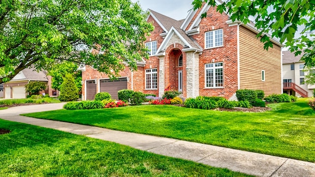 5327 Bamboo Ln, Naperville, IL 60564 - traditional home featuring a front lawn, concrete driveway, and brick siding