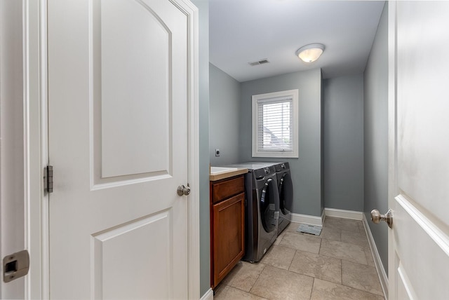5327 Bamboo Ln, Naperville, IL 60564 - laundry area with washer and clothes dryer and cabinet space