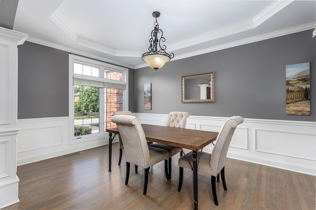 5327 Bamboo Ln, Naperville, IL 60564 - dining room featuring dark wood-style flooring, ornamental molding, a raised ceiling, and wainscoting