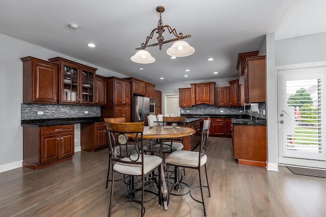 5327 Bamboo Ln, Naperville, IL 60564 - kitchen featuring appliances with stainless steel finishes, wood finished floors, tasteful backsplash, and recessed lighting