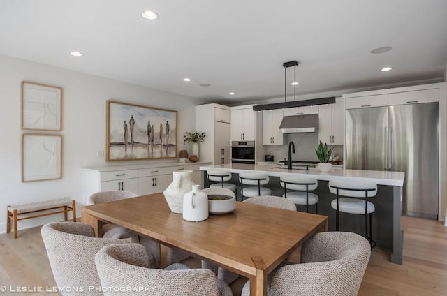 20 Pinnacle Ct, Naperville, IL 60565 - dining room featuring light wood-style flooring and recessed lighting