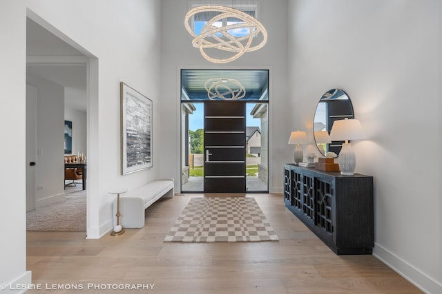 20 Pinnacle Ct, Naperville, IL 60565 - entrance foyer with wood finished floors, a chandelier, and a high ceiling