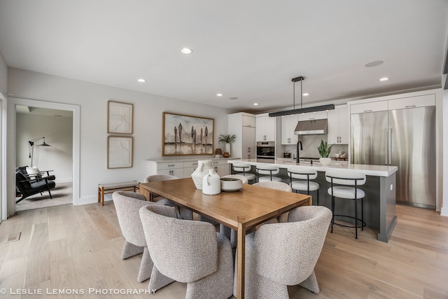 20 Pinnacle Ct, Naperville, IL 60565 - dining room with light wood-style flooring and recessed lighting