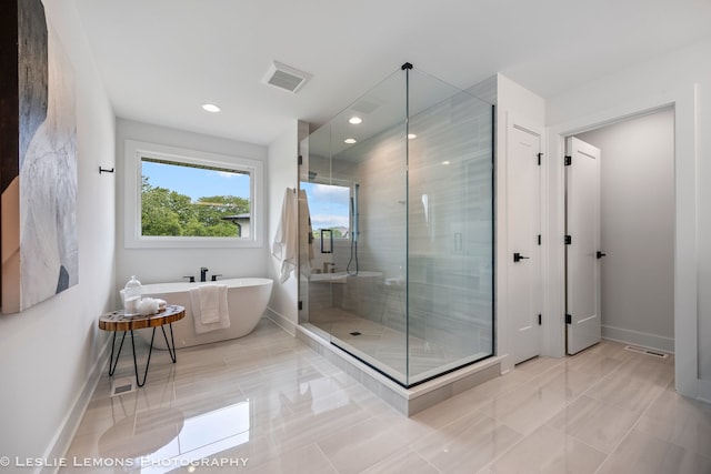20 Pinnacle Ct, Naperville, IL 60565 - bathroom featuring a freestanding tub, a shower stall, and recessed lighting