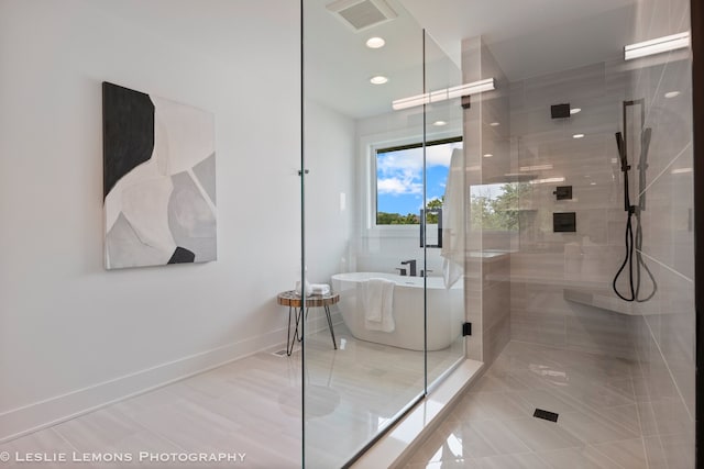 20 Pinnacle Ct, Naperville, IL 60565 - bathroom featuring a stall shower, a freestanding tub, tile patterned floors, and recessed lighting