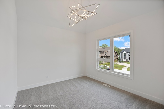 20 Pinnacle Ct, Naperville, IL 60565 - carpeted spare room featuring a chandelier and baseboards