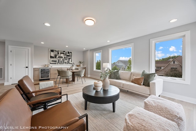 20 Pinnacle Ct, Naperville, IL 60565 - living area featuring wine cooler, light wood-style flooring, and recessed lighting