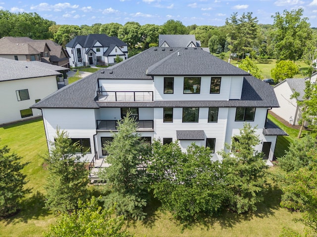 20 Pinnacle Ct, Naperville, IL 60565 - back of property featuring a balcony, a shingled roof, and a residential view