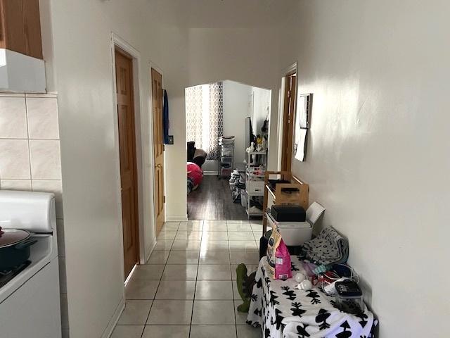 5536 S Albany Ave, Chicago, IL 60629 - hall with light tile patterned flooring