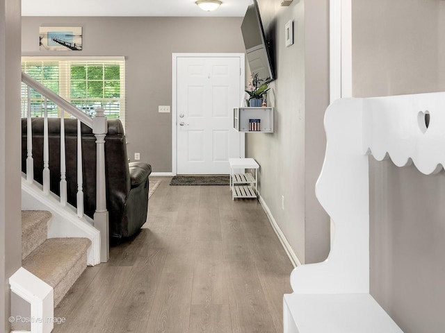 308 Ramsey Dr, Romeoville, IL 60446 - foyer entrance featuring wood finished floors and stairway