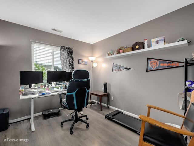 308 Ramsey Dr, Romeoville, IL 60446 - office space featuring wood finished floors and baseboards