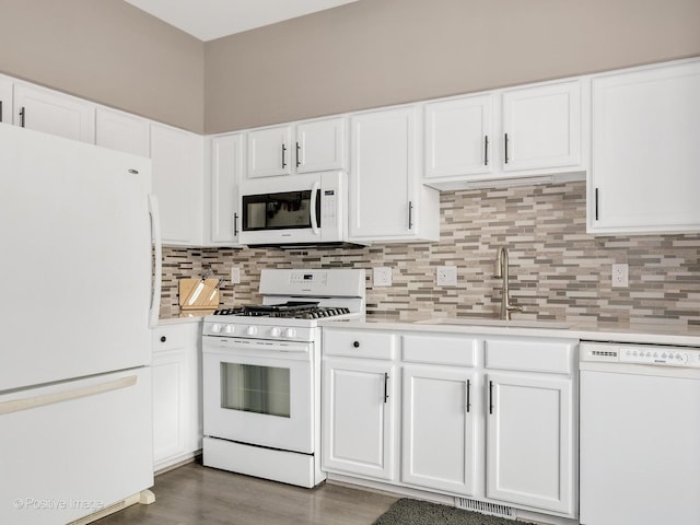 308 Ramsey Dr, Romeoville, IL 60446 - kitchen featuring white appliances, light countertops, tasteful backsplash, and white cabinetry