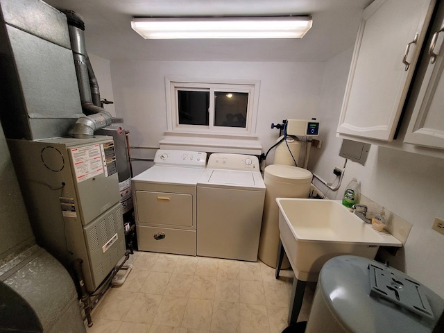 36441 N James Ct, Lake Villa, IL 60046 - washroom featuring washing machine and dryer, cabinet space, and heating unit