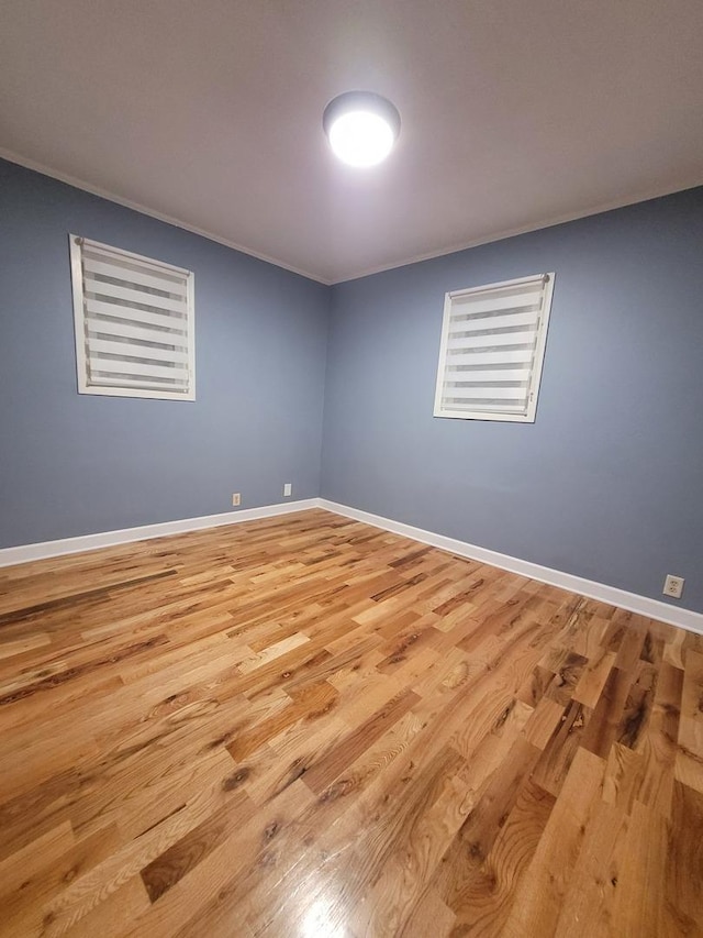 36441 N James Ct, Lake Villa, IL 60046 - unfurnished room with crown molding and wood finished floors