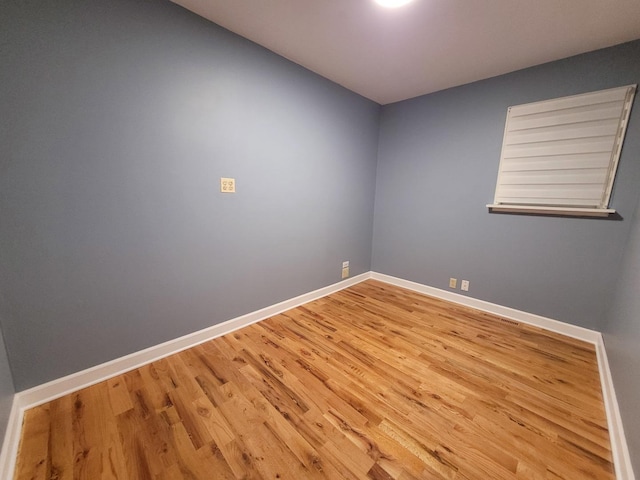 36441 N James Ct, Lake Villa, IL 60046 - empty room with wood finished floors and baseboards