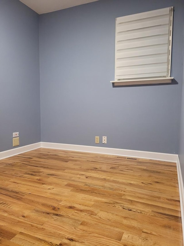 36441 N James Ct, Lake Villa, IL 60046 - unfurnished room featuring light wood-style flooring