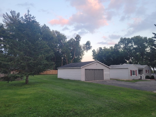 36441 N James Ct, Lake Villa, IL 60046 - view of green lawn with a garage