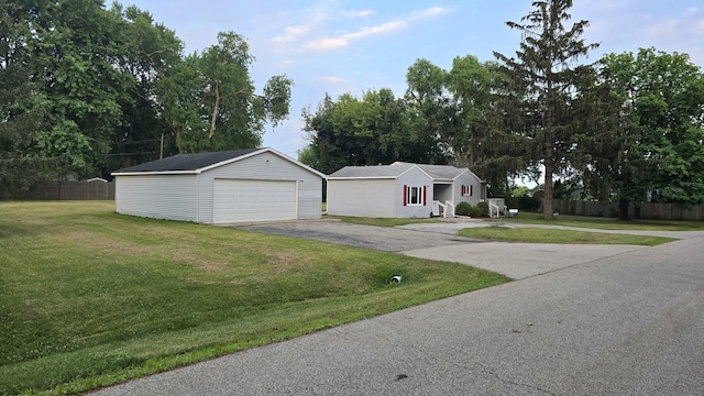 36441 N James Ct, Lake Villa, IL 60046 - view of front of house with an outdoor structure, a detached garage, and view of wooded area