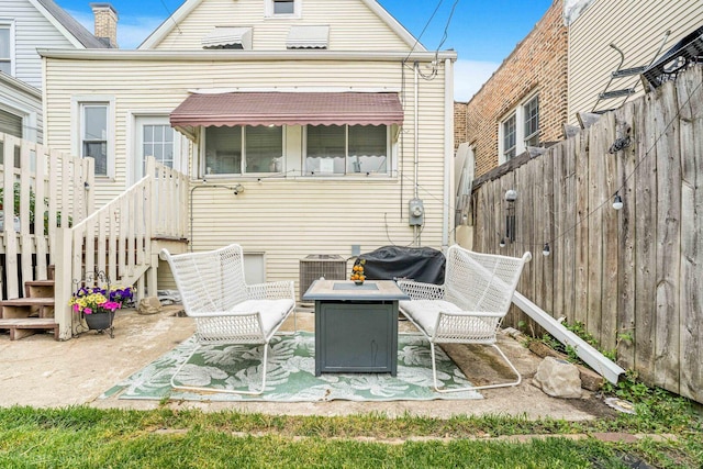 4025 W 24th St, Chicago, IL 60623 - rear view of house with a patio