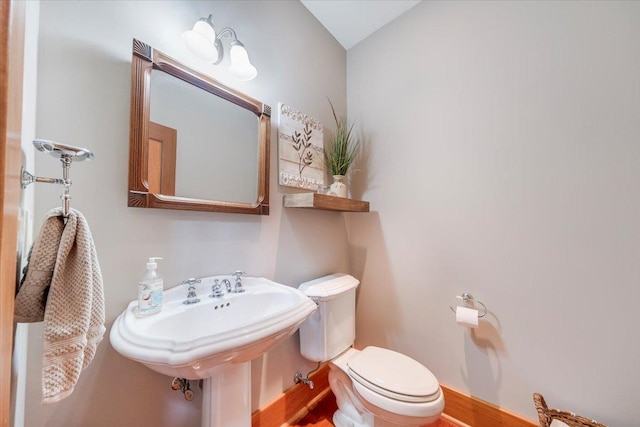 2 Timber Ridge Ln, Mansfield, IL 61854 - half bath featuring toilet and wood finished floors
