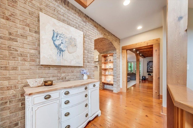 2 Timber Ridge Ln, Mansfield, IL 61854 - corridor featuring brick wall, light wood-type flooring, and recessed lighting