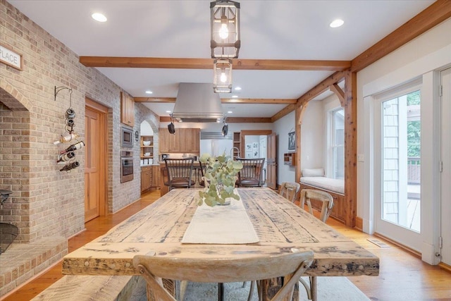 2 Timber Ridge Ln, Mansfield, IL 61854 - dining area featuring brick wall, beamed ceiling, light wood finished floors, and recessed lighting