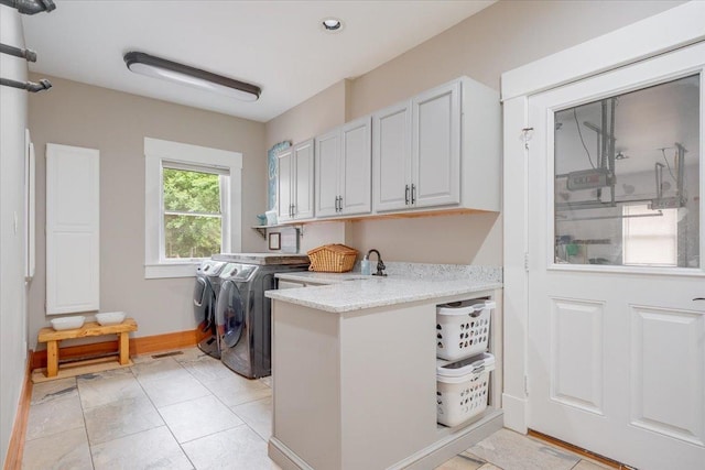 2 Timber Ridge Ln, Mansfield, IL 61854 - laundry room featuring washing machine and clothes dryer, cabinet space, and light tile patterned floors